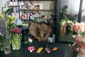 Photo of copy space in flower shop. Lifestyle flower shop. Family flower's business.